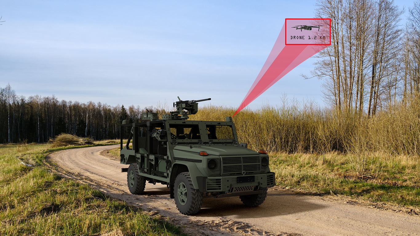 A computer render of Skyblazer mounted on Rheinmetall's Caracal air assault vehicle, stationary on a dirt road, for drone defence.